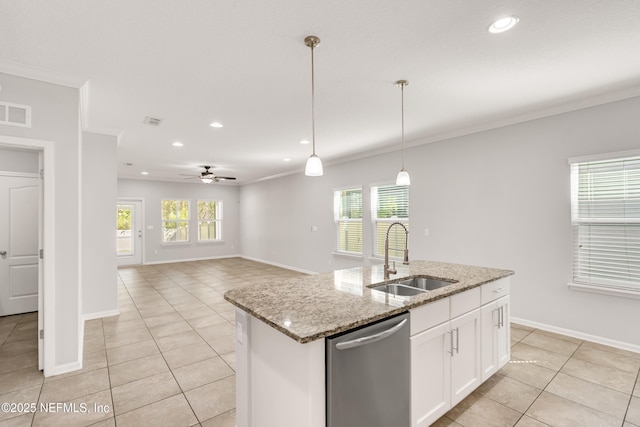 kitchen featuring pendant lighting, crown molding, visible vents, stainless steel dishwasher, and a sink