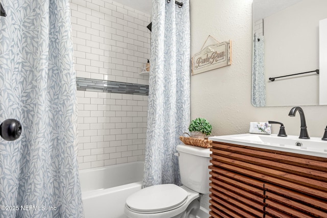 full bath with shower / bathtub combination with curtain, toilet, vanity, and a textured wall