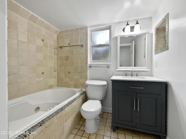 full bath with vanity, toilet, and tiled shower / bath