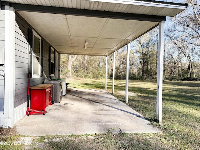 view of patio / terrace featuring a carport