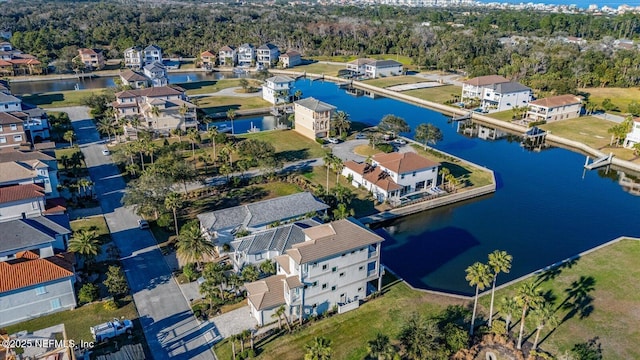 bird's eye view with a residential view and a water view