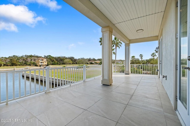 view of patio / terrace featuring a water view