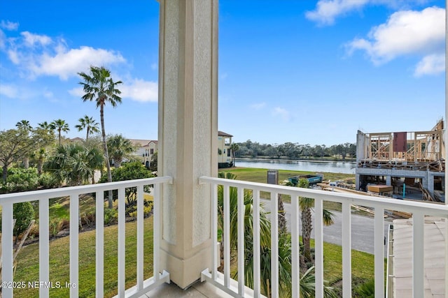 balcony featuring a water view