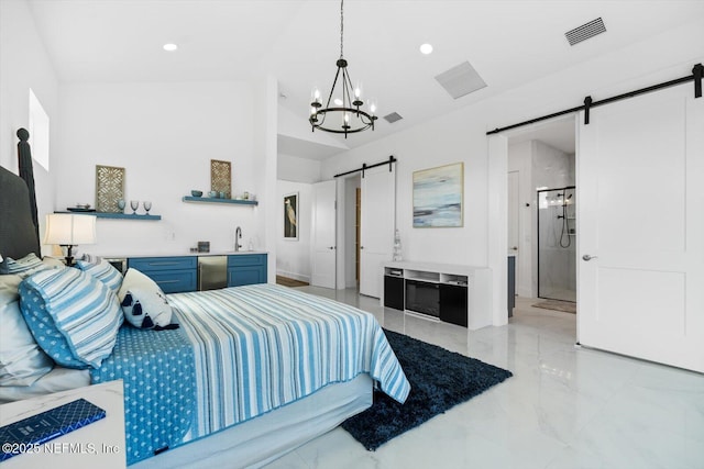 bedroom with a barn door, recessed lighting, visible vents, and marble finish floor