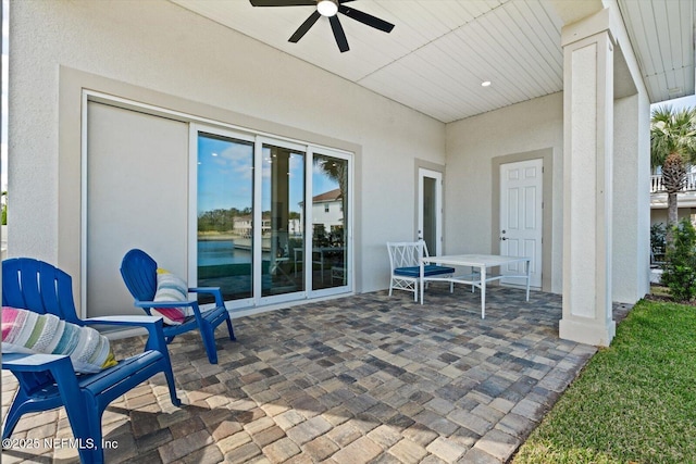 view of patio / terrace featuring a ceiling fan