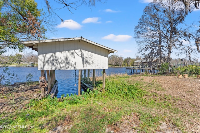 dock area with a water view