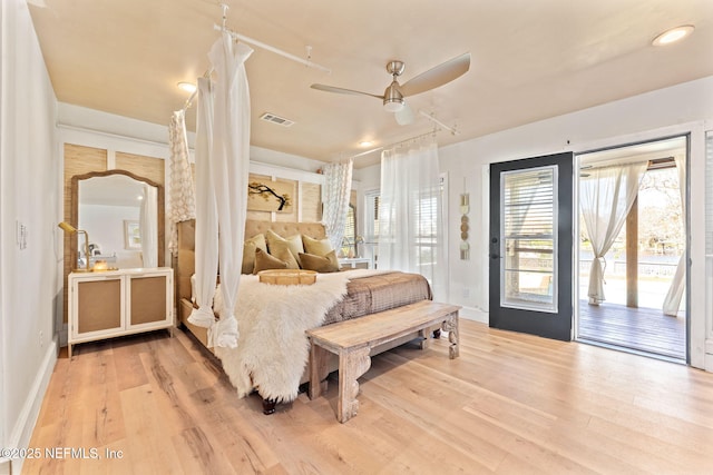 bedroom featuring light wood finished floors, visible vents, baseboards, ceiling fan, and access to exterior