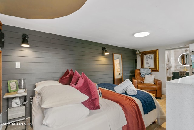 bedroom featuring wood finished floors