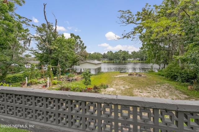 view of yard with a water view