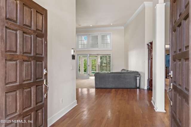 24620 Deer Trace Dr, Ponte Vedra Beach, FL 32082 - entrance foyer with a towering ceiling, baseboards, wood finished floors, and crown molding