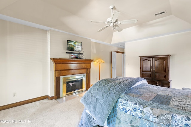 24620 Deer Trace Dr, Ponte Vedra Beach, FL 32082 - carpeted bedroom with visible vents, baseboards, a fireplace with flush hearth, lofted ceiling, and a ceiling fan