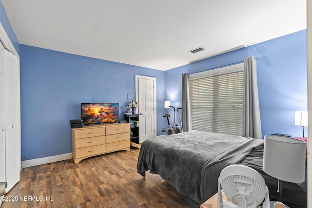 24620 Deer Trace Dr, Ponte Vedra Beach, FL 32082 - bedroom featuring a closet, visible vents, baseboards, and hardwood / wood-style flooring