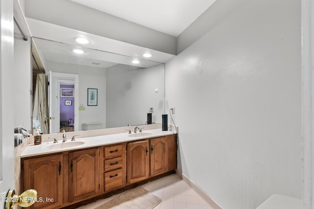 24620 Deer Trace Dr, Ponte Vedra Beach, FL 32082 - full bath featuring tile patterned flooring, double vanity, toilet, and a sink