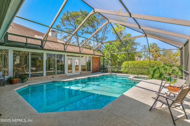 24620 Deer Trace Dr, Ponte Vedra Beach, FL 32082 - view of swimming pool with french doors, a pool with connected hot tub, a lanai, and a patio area