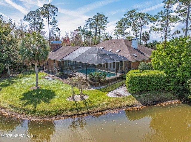 24620 Deer Trace Dr, Ponte Vedra Beach, FL 32082 - back of property with a lanai, a lawn, an outdoor pool, and a chimney