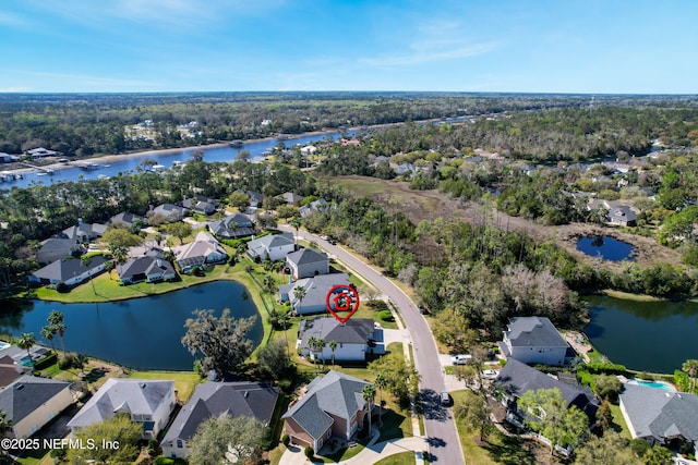 aerial view featuring a residential view and a water view