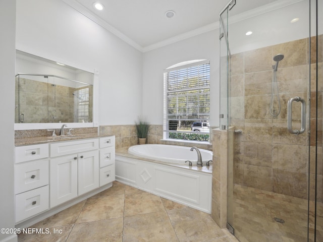 bathroom featuring vanity, a shower stall, a bath, and ornamental molding