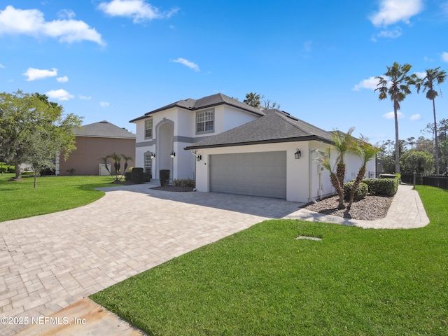 view of front of house with a front lawn, roof with shingles, stucco siding, decorative driveway, and an attached garage