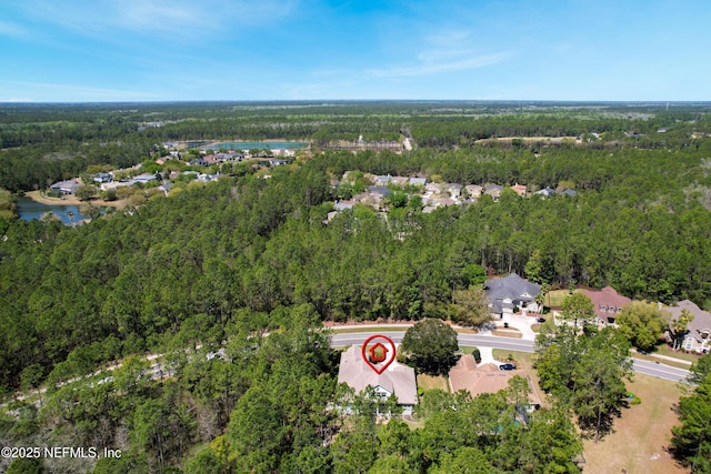 297 S Hampton Club Way, Saint Augustine, FL 32092 - drone / aerial view featuring a wooded view and a water view
