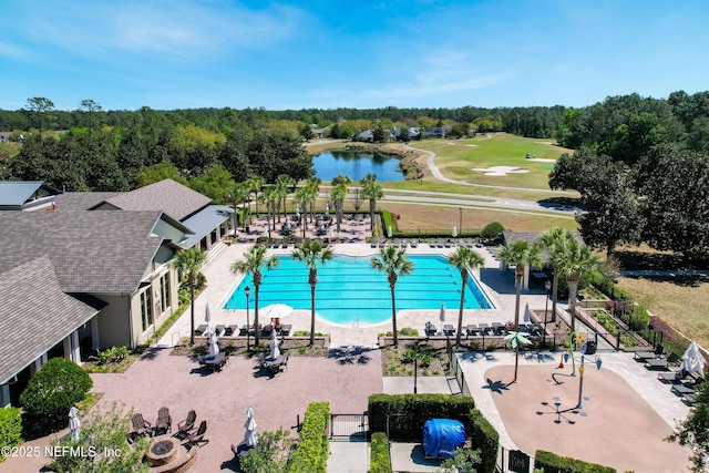 297 S Hampton Club Way, Saint Augustine, FL 32092 - community pool featuring a patio area, a water view, and fence
