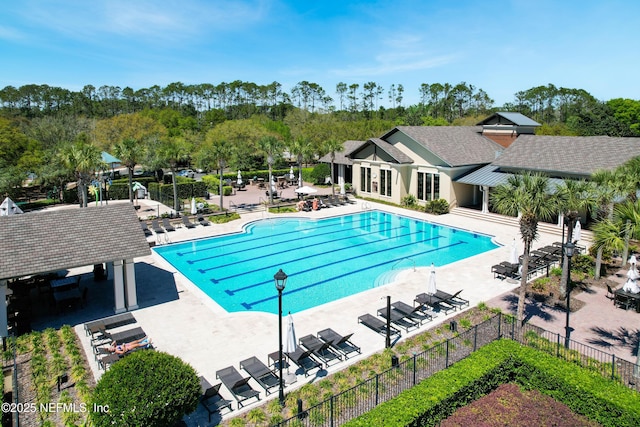 297 S Hampton Club Way, Saint Augustine, FL 32092 - pool with fence and a patio area