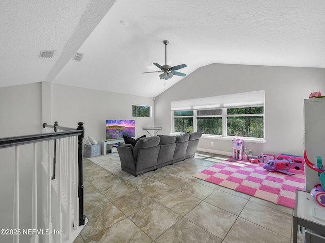 297 S Hampton Club Way, Saint Augustine, FL 32092 - living room with a textured ceiling, ceiling fan, visible vents, and vaulted ceiling