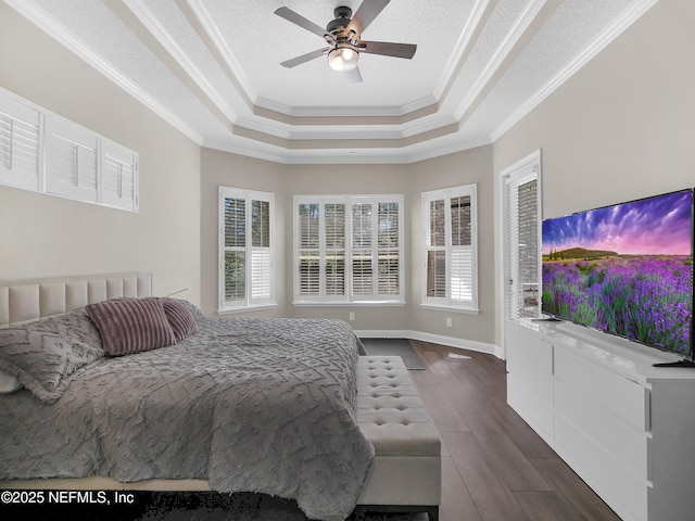 297 S Hampton Club Way, Saint Augustine, FL 32092 - bedroom with a textured ceiling, crown molding, baseboards, a raised ceiling, and wood tiled floor