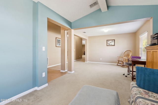 sitting room with vaulted ceiling with beams, baseboards, visible vents, and light colored carpet