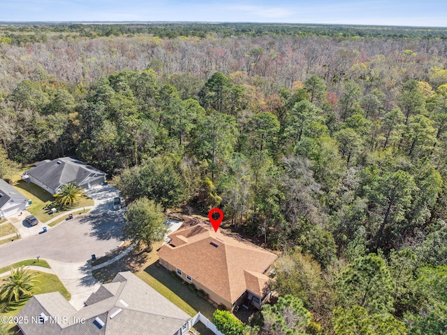 drone / aerial view with a forest view