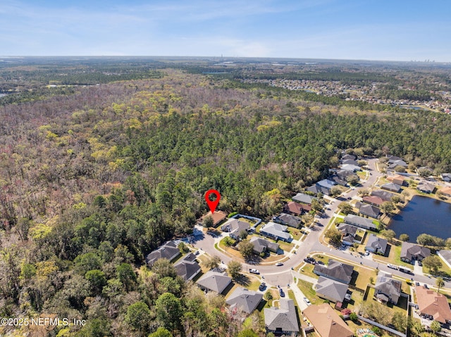 aerial view with a residential view and a forest view