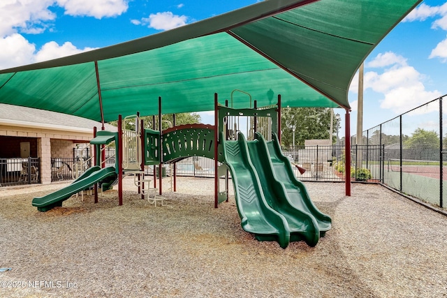 community playground featuring fence