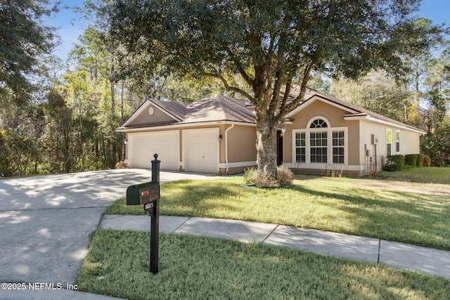 single story home with a garage, concrete driveway, a front lawn, and stucco siding