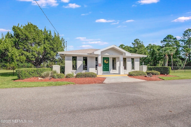 17524 Eagle Bend Blvd, Jacksonville, FL 32226 - view of front facade with fence and brick siding
