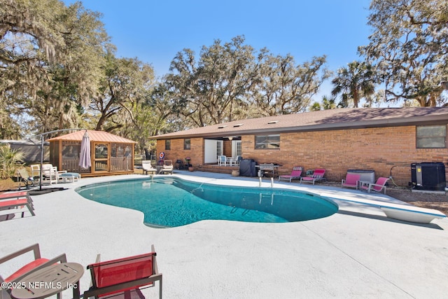 17524 Eagle Bend Blvd, Jacksonville, FL 32226 - outdoor pool featuring a patio area, central AC, a gazebo, and a diving board