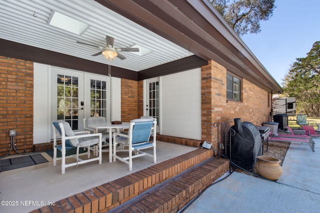 17524 Eagle Bend Blvd, Jacksonville, FL 32226 - view of patio / terrace featuring a ceiling fan, french doors, a grill, and outdoor dining area