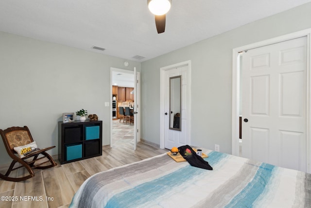 17524 Eagle Bend Blvd, Jacksonville, FL 32226 - bedroom featuring a ceiling fan, visible vents, and wood finished floors