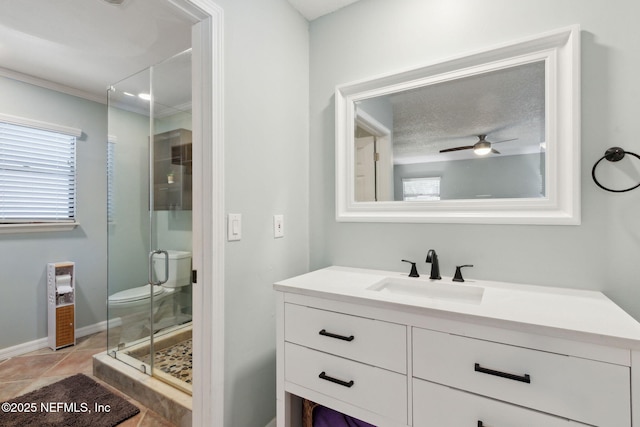 17524 Eagle Bend Blvd, Jacksonville, FL 32226 - bathroom featuring ceiling fan, vanity, baseboards, tile patterned floors, and a stall shower