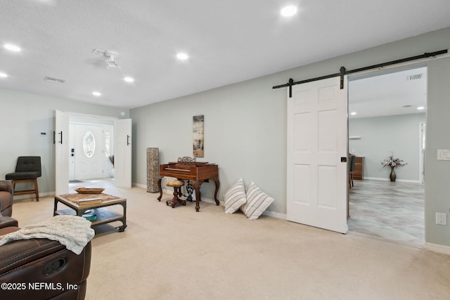 17524 Eagle Bend Blvd, Jacksonville, FL 32226 - living room with carpet, visible vents, recessed lighting, and a barn door