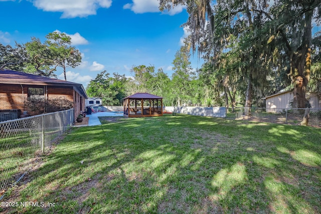17524 Eagle Bend Blvd, Jacksonville, FL 32226 - view of yard with a gazebo and a fenced backyard