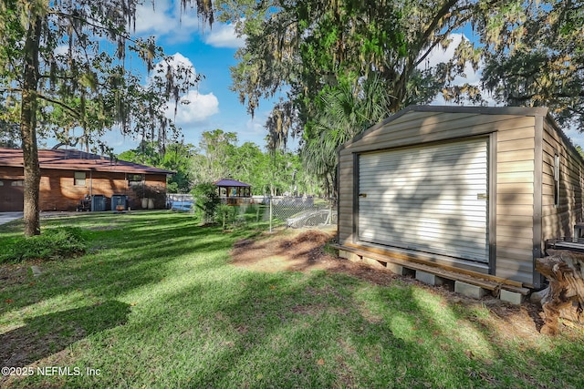 17524 Eagle Bend Blvd, Jacksonville, FL 32226 - view of yard with a storage shed, an outdoor structure, and fence