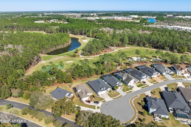 birds eye view of property with a residential view, view of golf course, a water view, and a forest view