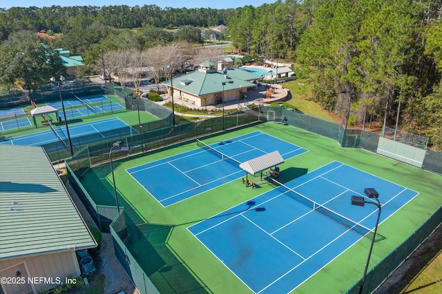 view of sport court with fence