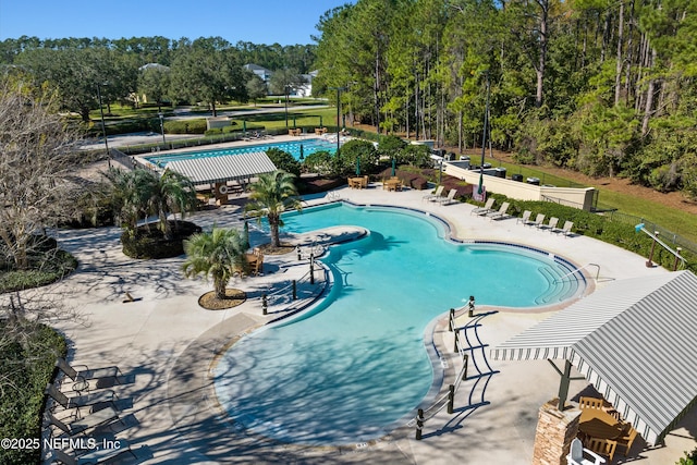 pool with a patio area