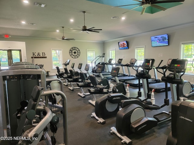 workout area featuring french doors, ornamental molding, visible vents, and a ceiling fan