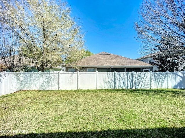 view of yard with fence