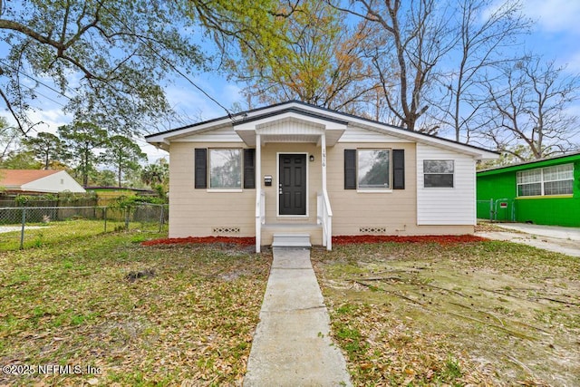 bungalow featuring crawl space and fence