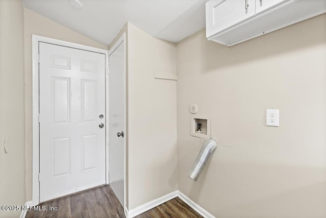 laundry room with dark wood-style floors, washer hookup, cabinet space, and baseboards