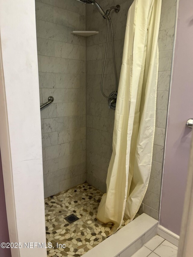 full bathroom with a stall shower