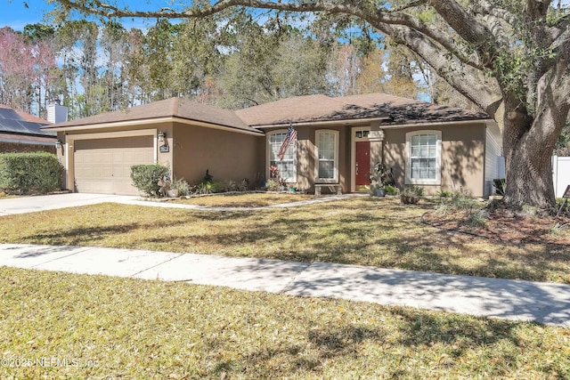 ranch-style home featuring a front lawn, a garage, driveway, and stucco siding