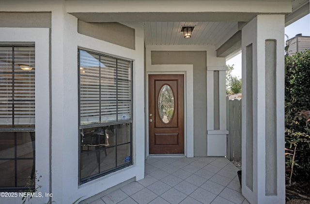 doorway to property with stucco siding